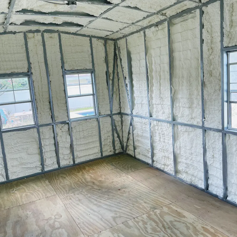 Closed-cell spray foam insulation applied to wall cavities in a residential project in Forestdale