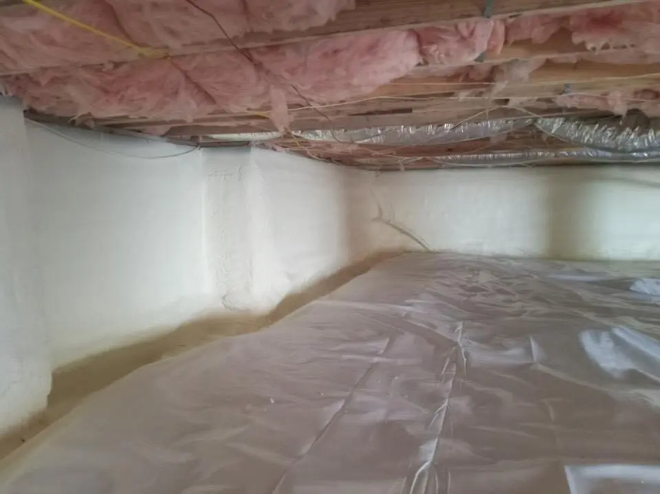 Crawl space encapsulation with closed-cell spray foam for Commercial Roof Restoration in Forestdale